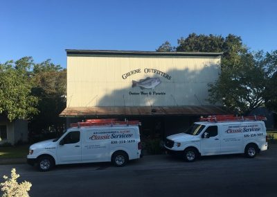 classic ac trucks parked outside